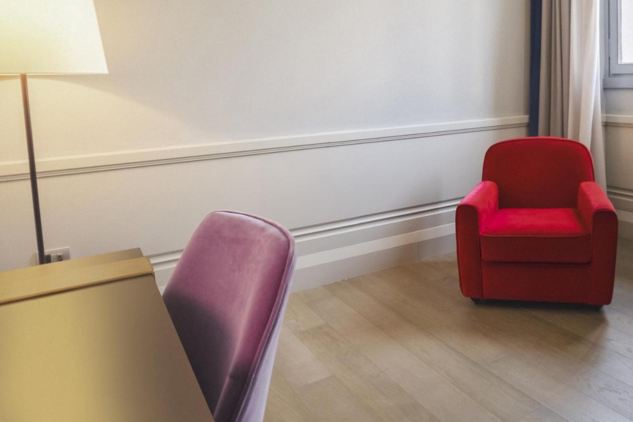 Palazzo Cornalia Hotel Milánó Kültér fotó A chair in a room