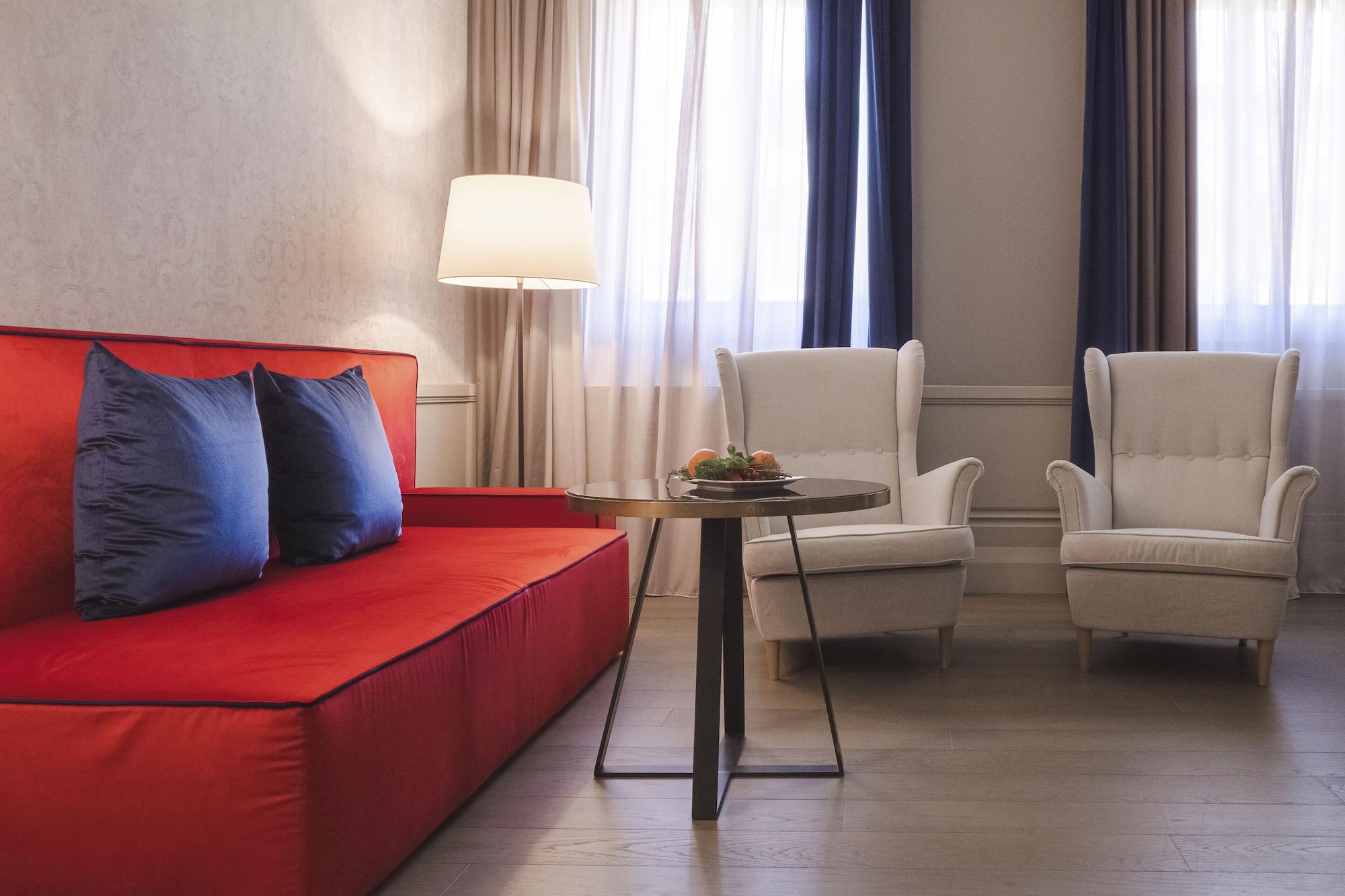 Palazzo Cornalia Hotel Milánó Kültér fotó A suite at the Hotel
