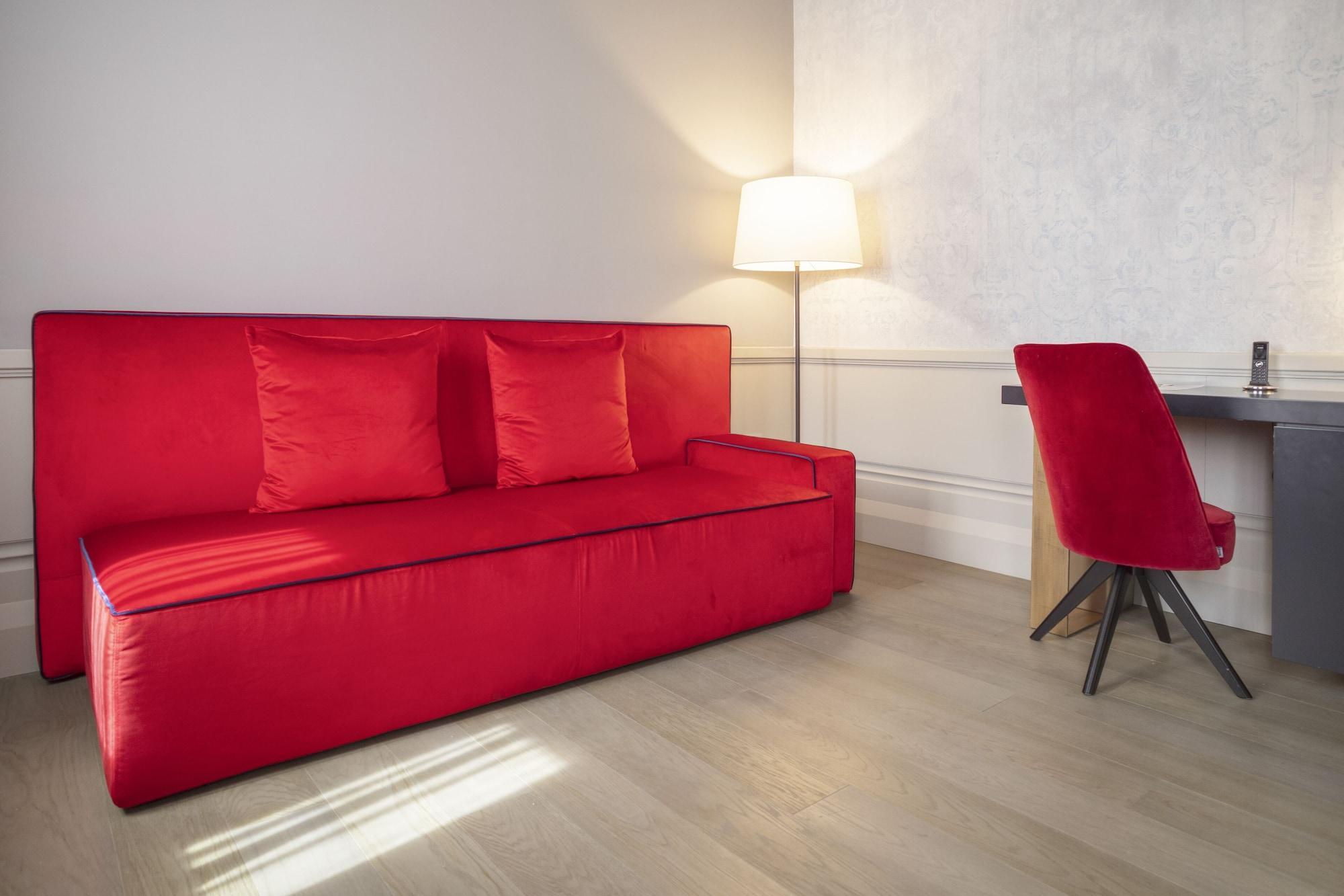 Palazzo Cornalia Hotel Milánó Kültér fotó A red sofa
