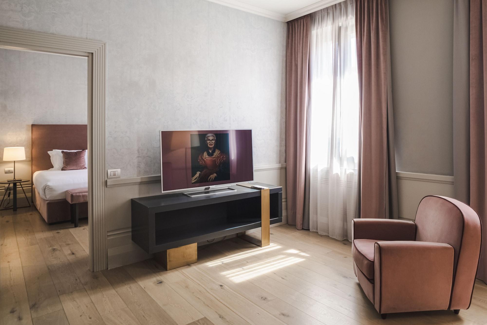 Palazzo Cornalia Hotel Milánó Kültér fotó A suite at the hotel