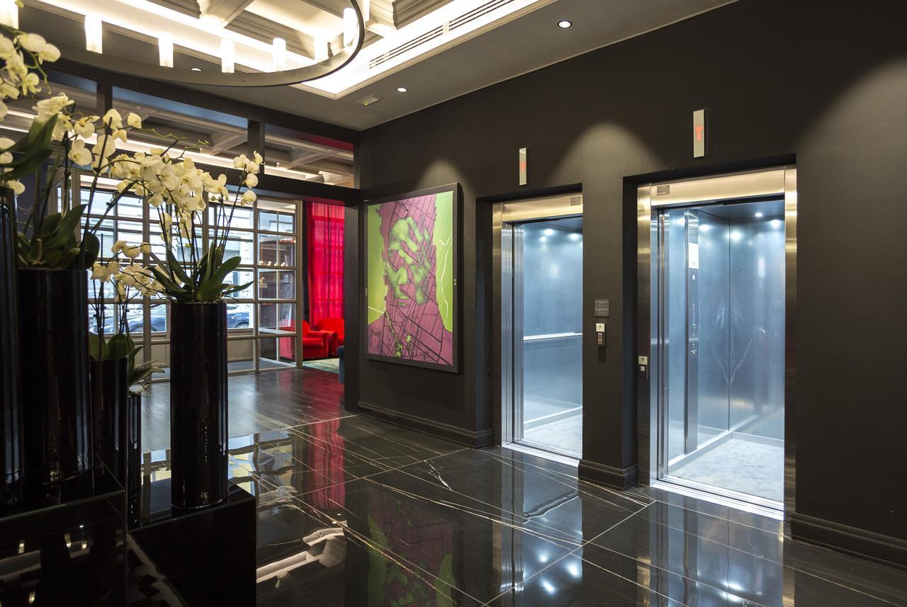 Palazzo Cornalia Hotel Milánó Kültér fotó Elevators in a hotel